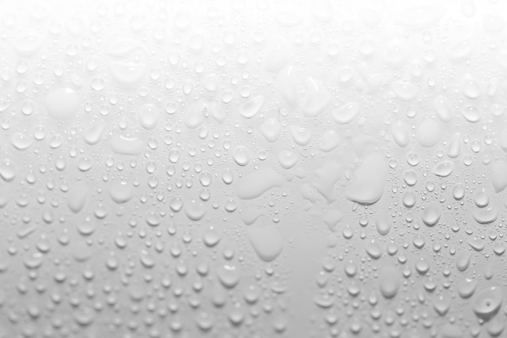 Moisture droplets on gray background that hinder keeping coffee fresh
